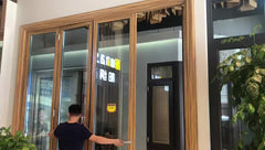 Aluminium alloy NOA code bulletproof glass accordion door for supplying installation on China WDMA