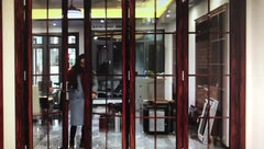 Wooden color powder coated toughened glass bi fold glass doors on China WDMA